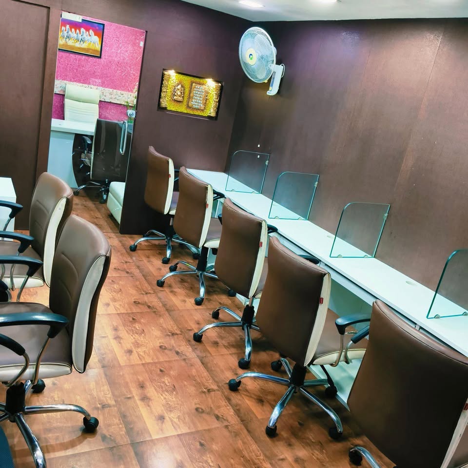 Row of dedicated desks along the wall